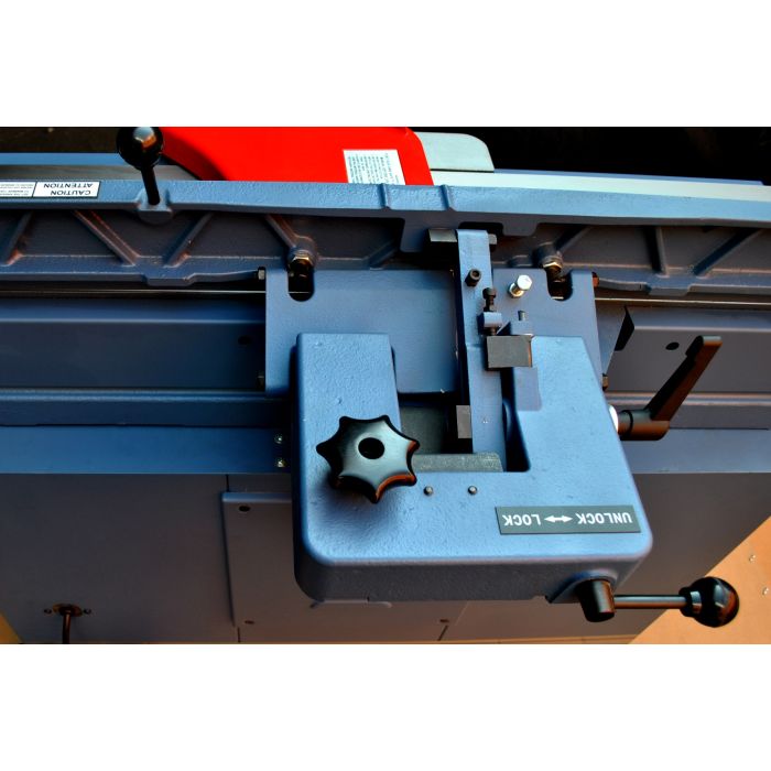 tilting fence with locking lever and positive stops at 45 degrees and 90 degrees