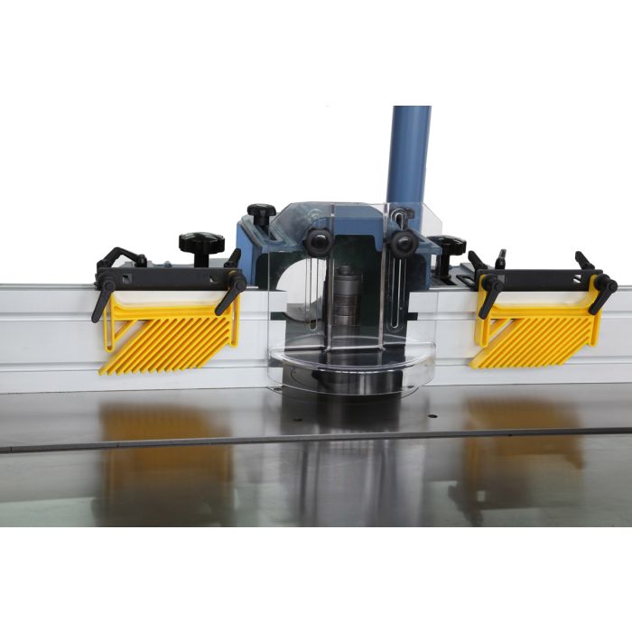 adjustable fence with feather board hold downs and clear view spindle guard