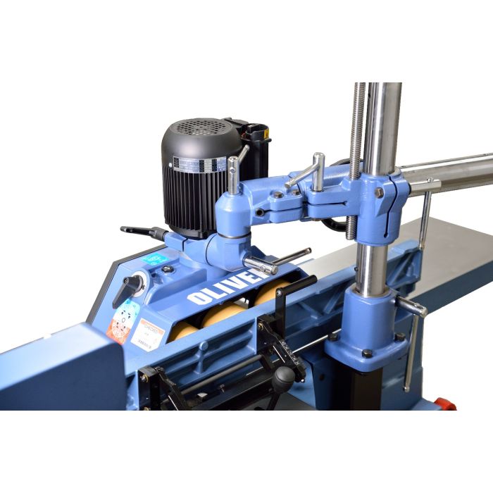 3 roll powered stock feeder mounted on a jointer