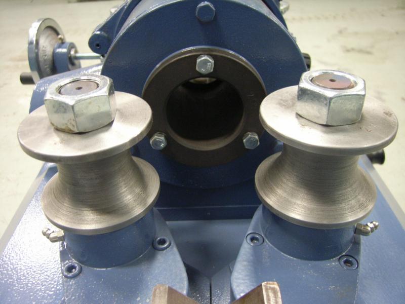 round rod milling machine outtake wheels and stock channel