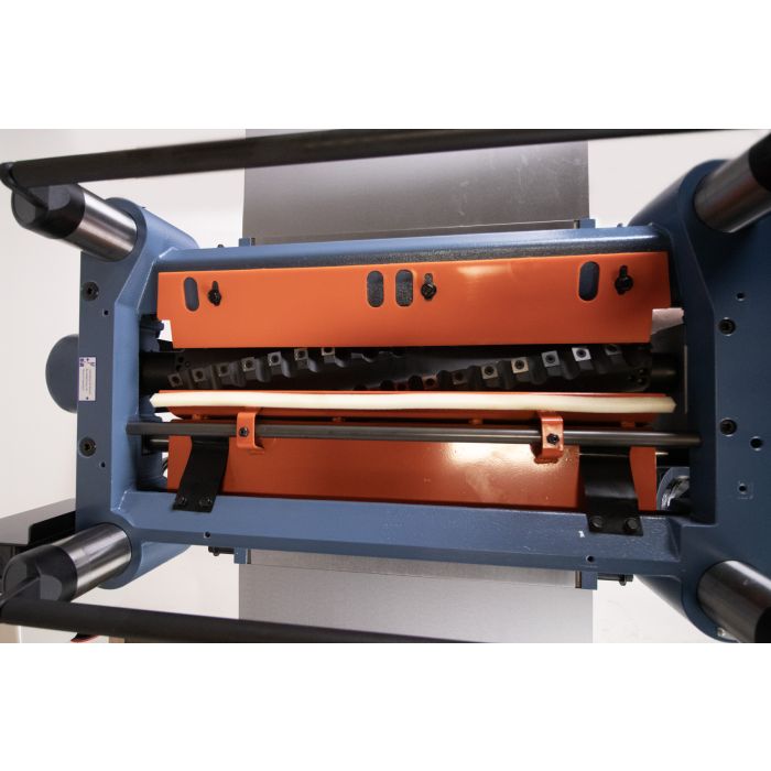 view from above showing pressure bar, chip breaker, and helical cutterhead